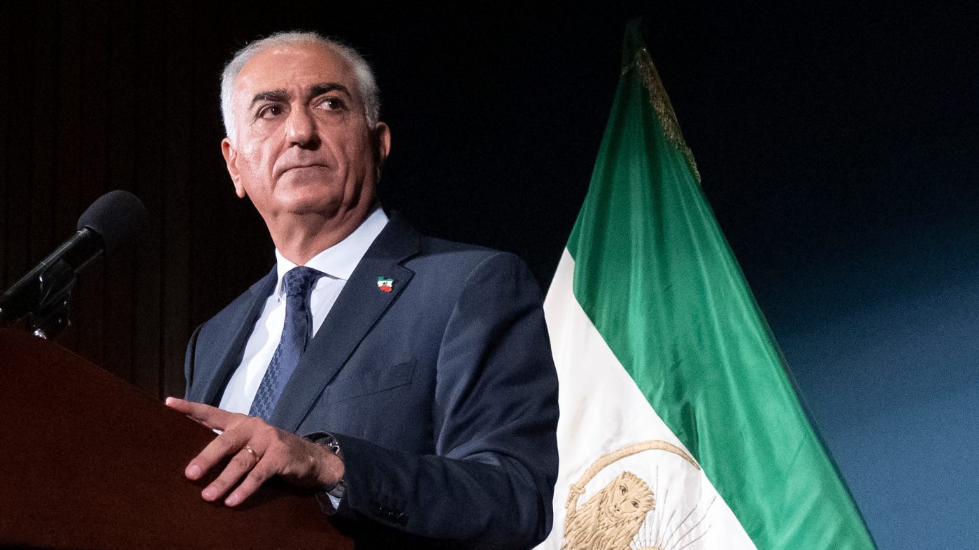 Exiled Iranian Prince Splattered with Red Liquid at Berlin Press Conference