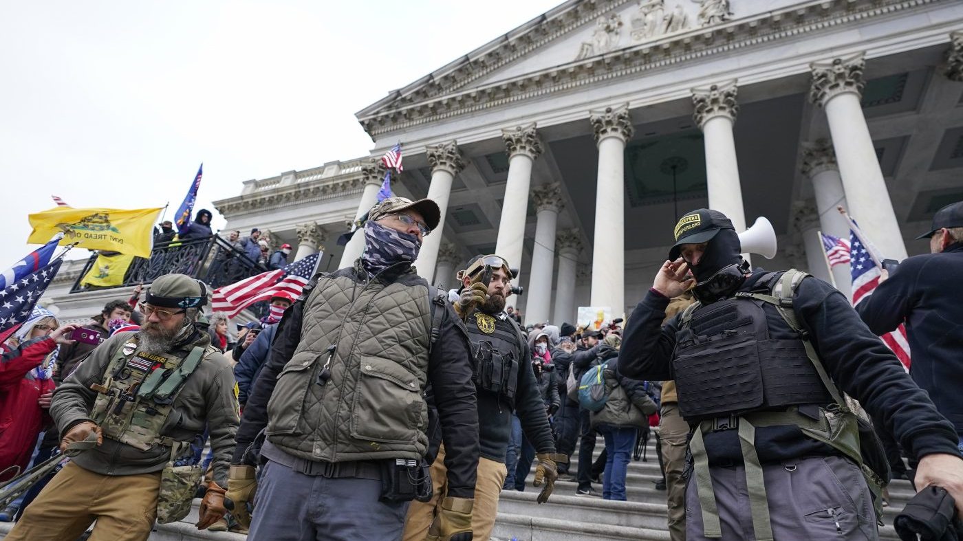 Judge reluctantly dismisses Oath Keepers cases, decrying DOJ move
