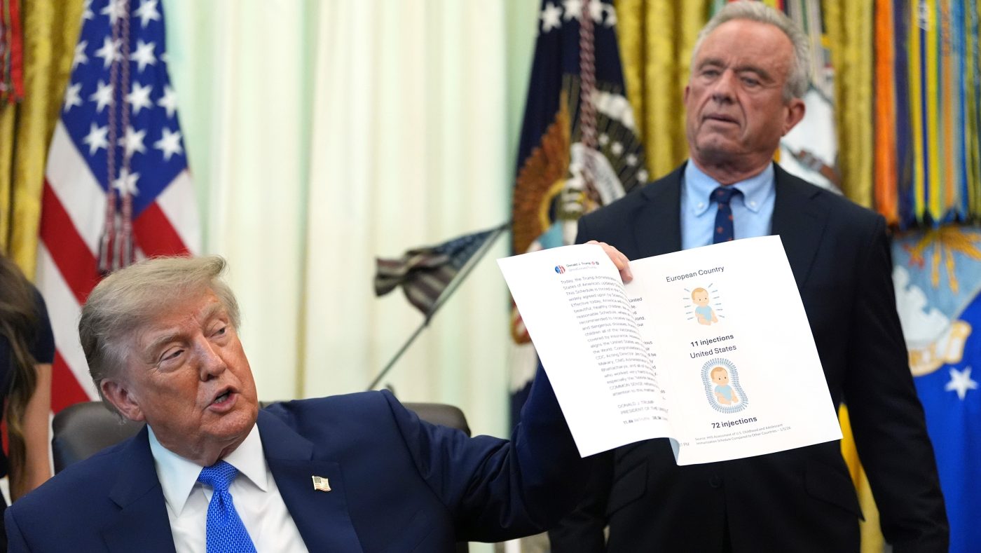 Trump signs order slashing childhood vaccine schedule, splitting MMR