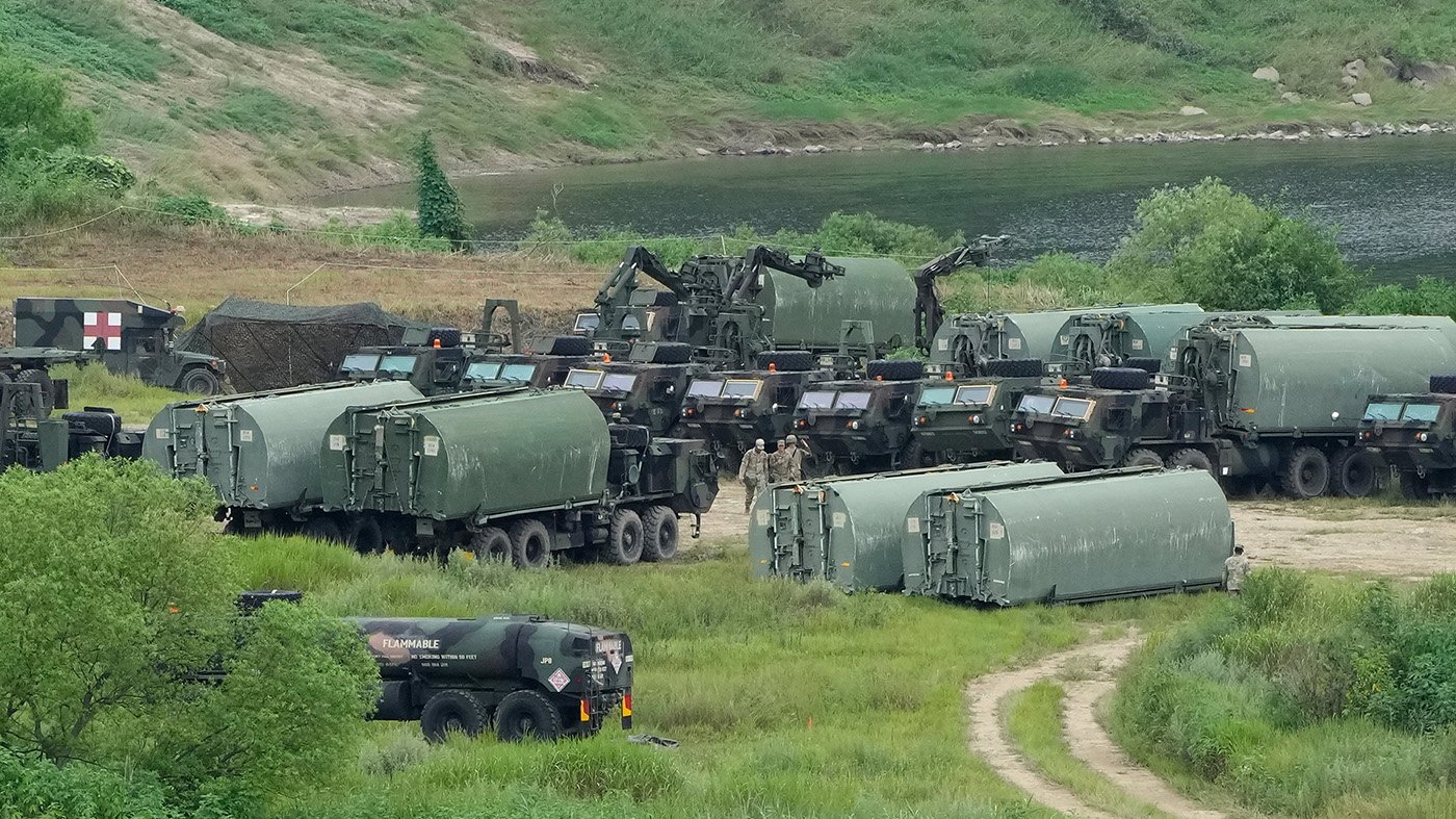 Trump Slashes Korea Drills, Cites Seoul's Iran Snub